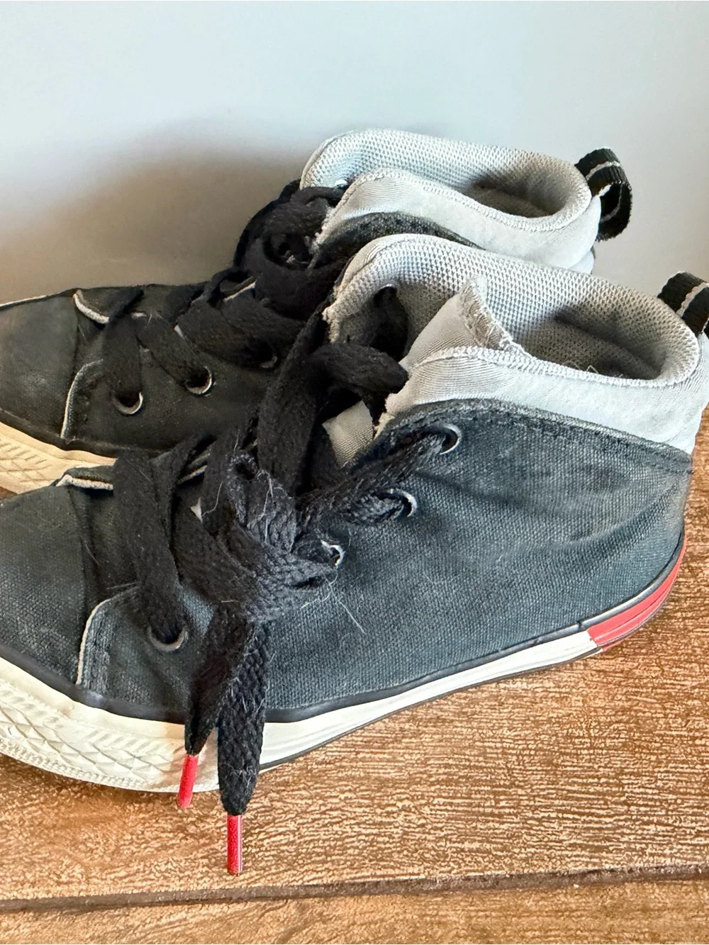 Converse Kids Black High-Top Canvas Sneakers with Gray Collar and Red Lace Tips